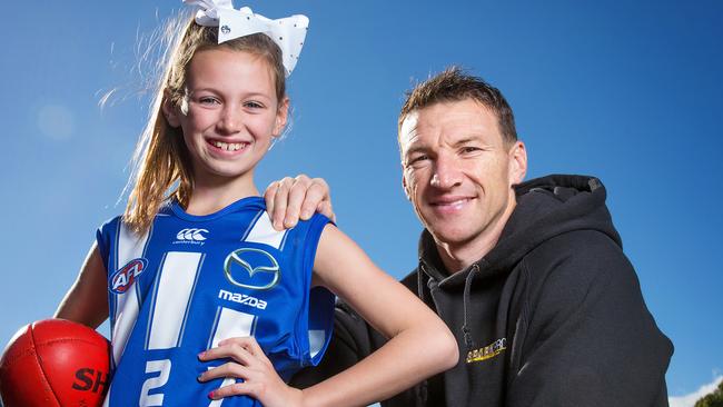 Brent Harvey hopes to one day see his daughter, Lacie, play for a North Melbourne AFLW team. Picture: Mark Stewart