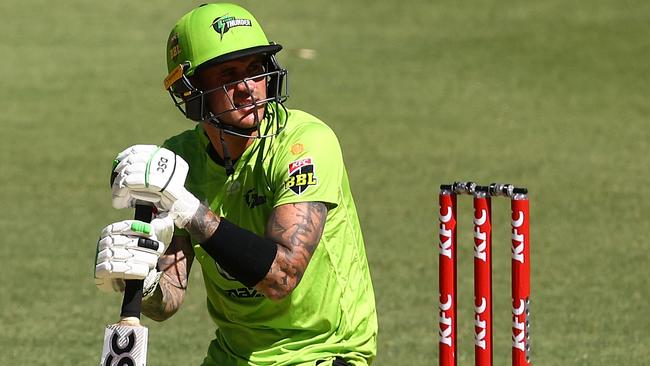 PERTH, AUSTRALIA - JANUARY 07: Alex Hales of the Thunder looks on after being struck by the ball during the Big Bash League match between the Hobart Hurricanes and the Sydney Thunder at Optus Stadium, on January 07, 2021, in Perth, Australia. (Photo by Paul Kane/Getty Images)