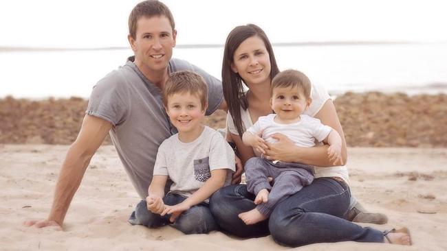 POIGNANT: Damien Little, Koda, 4, Melissa and baby Hunter enjoy a day at the beach in a photo released by the family.