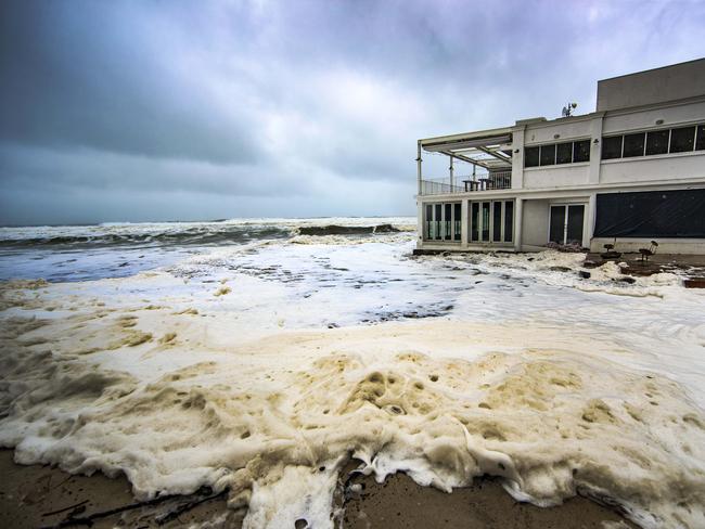 Rick Shores at Burleigh Heads during the storm on Monday. Picture: Nigel Hallett