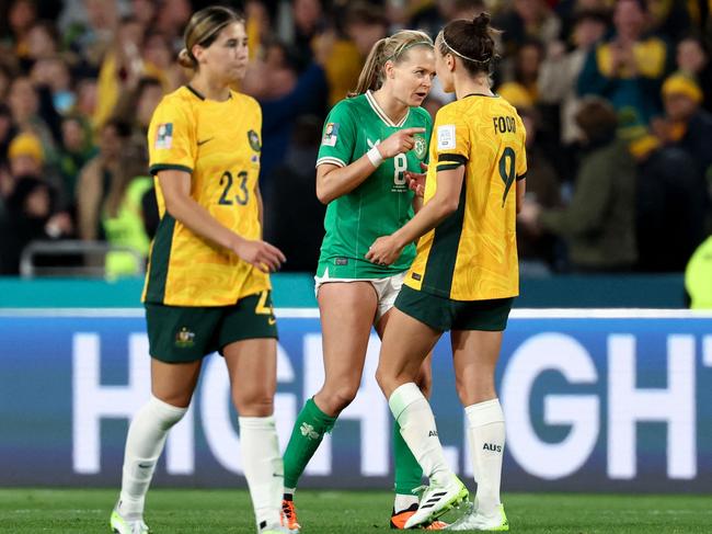 Ireland's midfielder Ruesha Littlejohn speaks to Australia's forward Caitlin Foord (right) after the Australia and New Zealand 2023 Women's World Cup Group B football match between Australia and Ireland at Stadium Australia in 2023. Picture: David Gray/AFP