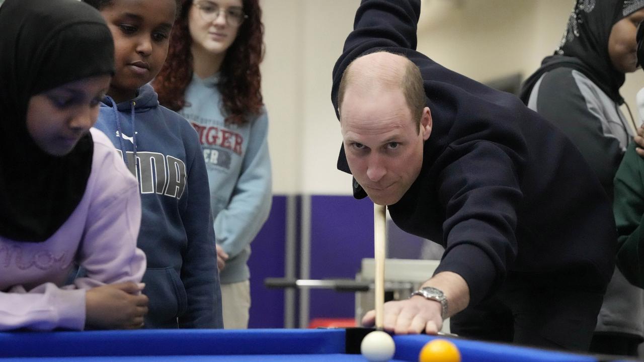 Willy playing pool as Kate cops the slack, on March 14. Picture: Frank Augstein – WPA Pool/Getty Images