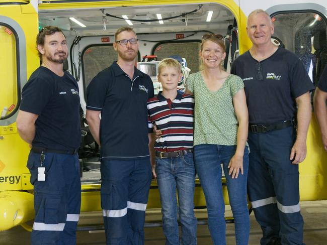 From left to right: RACQ LifeFlight Co-Pilot Nick McDonald, RACQ LifeFlight Critical Care Doctor David Wedgwood (no e), Cooper Prior, Helen Prior (Cooper's mother), RACQ LifeFlight Pilot David Hampshire, RACQ LifeFlight Co-Pilot Andrew Caldwell. Picture:  LifeFlight