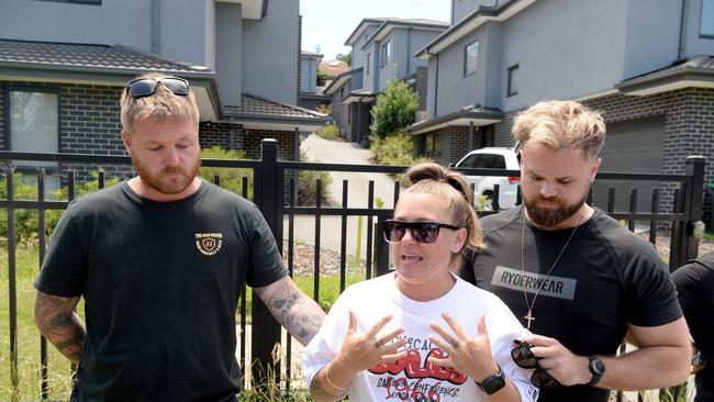 Dr Gordon’s sister, Natalie Gordon, speaks at the scene alongside her partner Hayden Cook and housemate Tristen Standing. Picture: Andrew Henshaw