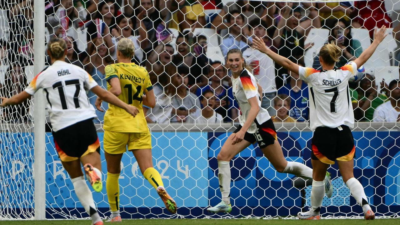 Germany's midfielder Jule Brand celebrates scoring her team's third goal. Picture: AFP