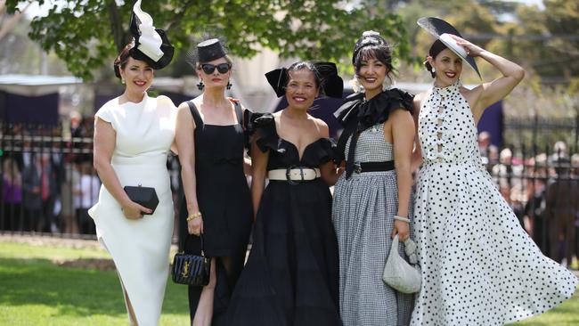 Ladies in traditional style at the Penfolds Victoria Derby day races at Flemington Racecourse. Picture: NewsWire/ David Crosling