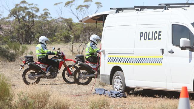 Police during a search in the state’s Mid-North for the body of Robert Atkins. Picture Emma Brasier