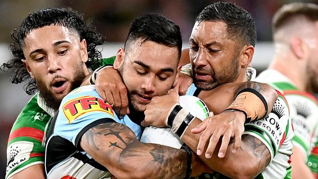 The Rabbitohs held on after a brave Sharks fight back.