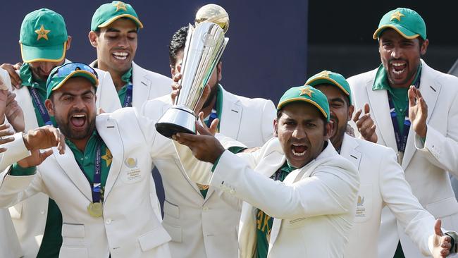 Pakistan's captain Sarfraz Ahmed, front, celebrates winning the Champions Trophy.