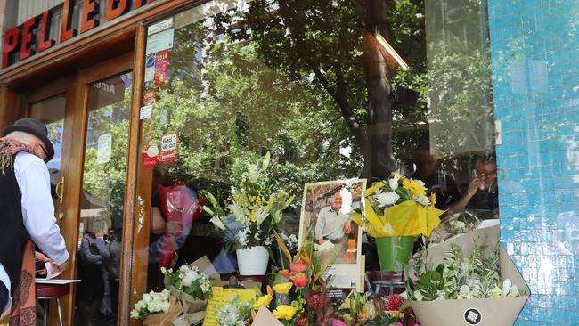 Floral and other tributes outside Pellegrini’s after Mr Malaspina’s murder. Picture: Alex Coppel.