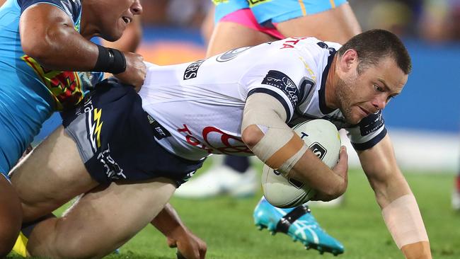 GOLD COAST, AUSTRALIA - SEPTEMBER 01: Shaun Fensom of the Cowboys scores a try during the round 25 NRL match between the Gold Coast Titans and the North Queensland Cowboys at Cbus Super Stadium on September 1, 2018 in Gold Coast, Australia. (Photo by Chris Hyde/Getty Images)