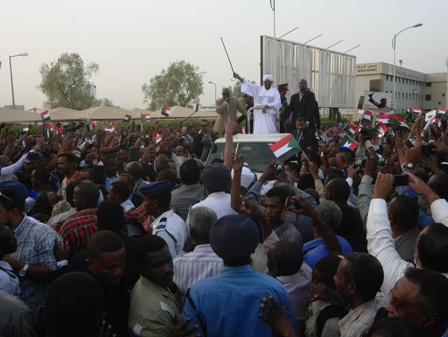 Sudan was dealt a further economic blow when the southern oil-rich part of their country succeeded in 2011, making any outstanding payments to the IMF even more difficult. Still, Sudanese President Omar al-Bashir is surrounded by supporters on his return from South Africa in June. He returned to Khartoum after a court in South Africa had ordered his arrest based on an international warrant for war crimes charges.