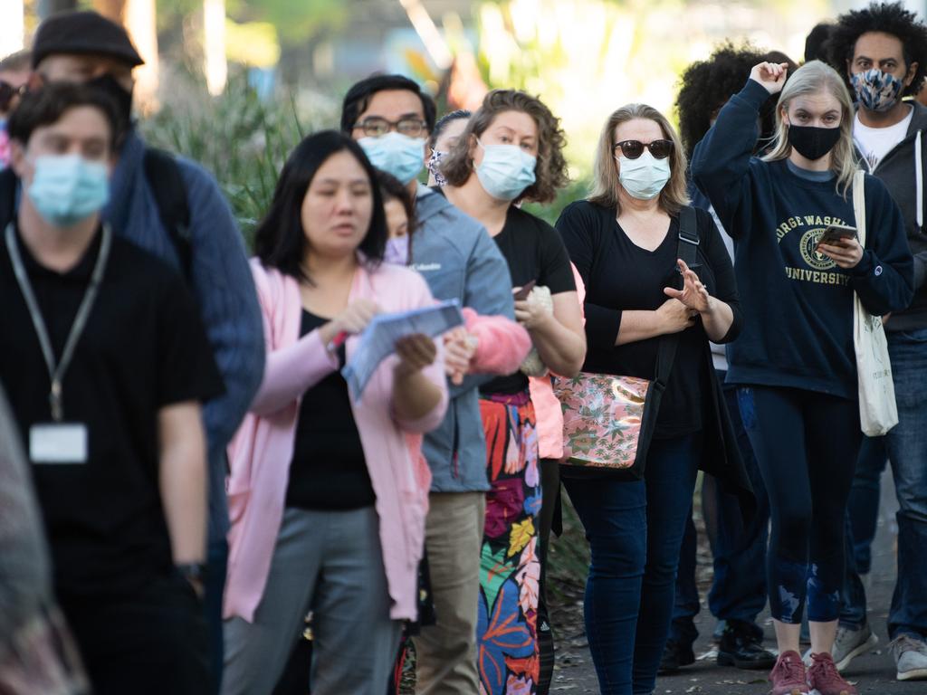 People queuing to enter the NSW Vaccination Centre in Homebush. Picture: NCA NewsWire / James Gourley