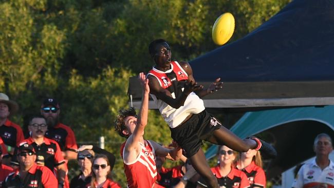 AFL Capricornia Men's grand final: BITS Saints' Ubil Chol flies