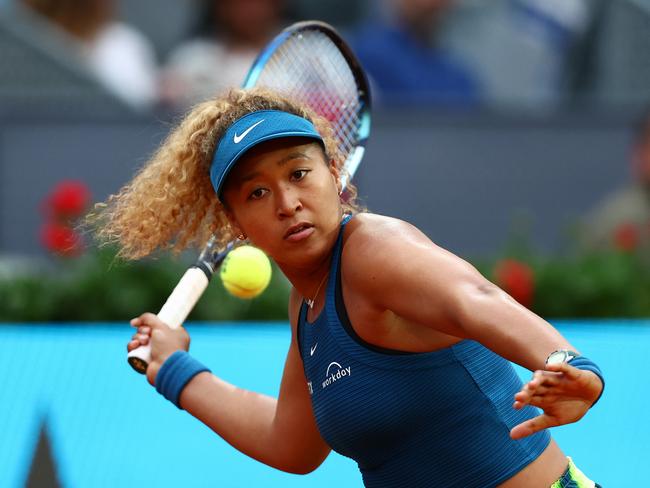 MADRID, SPAIN - MAY 01: Naomi Osaka of Japan plays a forehand against against Sara Sorribes Tormo of Spain during their Round of 32 match on Day Four of the Mutua Madrid Open at La Caja Magica on May 01, 2022 in Madrid, Spain. (Photo by Clive Brunskill/Getty Images)