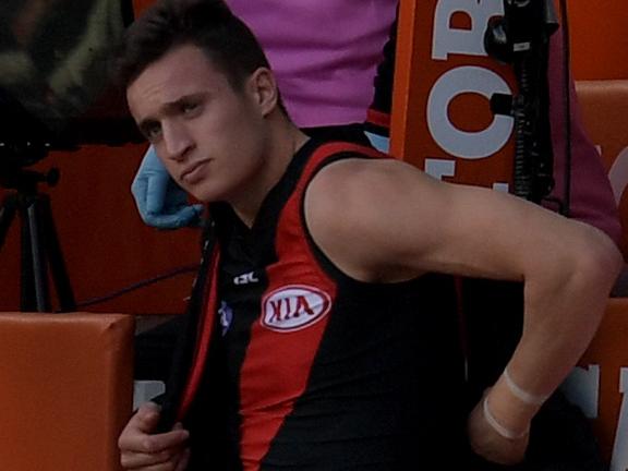 Orazio Fantasia of the Bombers sits in the bunker after injuring his hamstring during the Round 20 AFL men's match between the Essendon Bombers and the Carlton Blues at the MCG in Melbourne, Saturday, August 5, 2017. (AAP Image/Tracey Nearmy) NO ARCHIVING, EDITORIAL USE ONLY