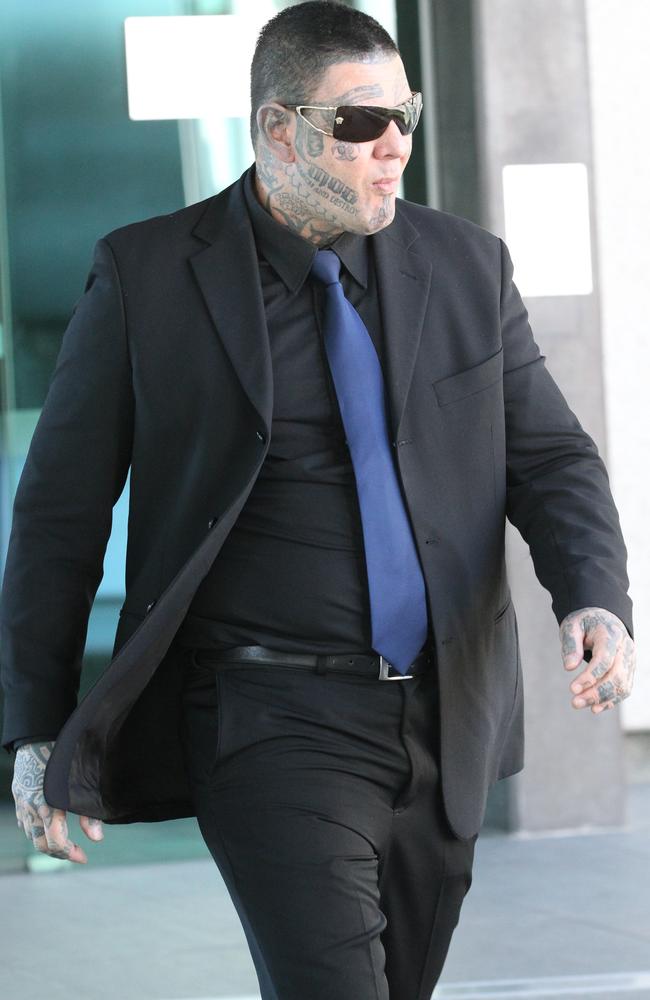 Jacques Teamo arrives at court to be sentenced for his involvement in the September 2013 bikie brawl at Broadbeach.