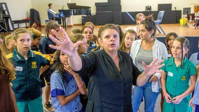 ON SONG: Opera singer Deborah Cheetham tutors local indigenous students in singing as part of a week-long residency at the Clarence Valley Conservatorium in 2016. Ms Cheetham has been critical of the Australian national anthem, refusing to sing it at a grand final because of its absence of indigenous recognition. Picture: Adam Hourigan