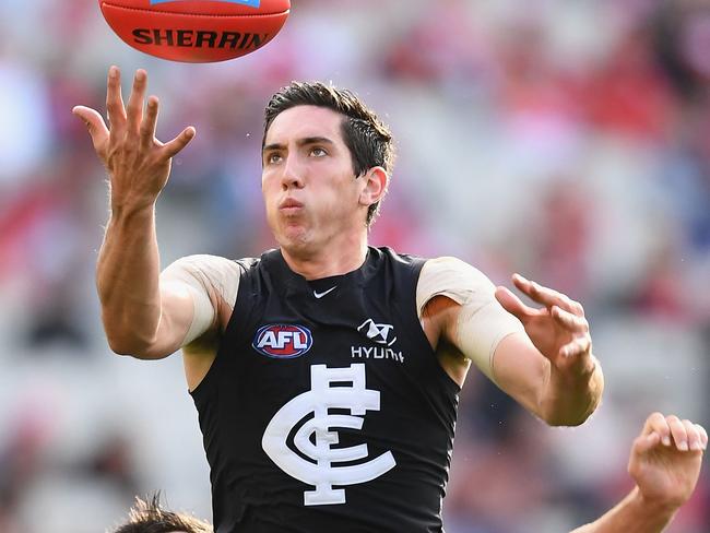 MELBOURNE, AUSTRALIA - APRIL 29:  Jacob Weitering of the Blues marks during the round six AFL match between the Carlton Blues and the Sydney Swans at Melbourne Cricket Ground on April 29, 2017 in Melbourne, Australia.  (Photo by Quinn Rooney/Getty Images)