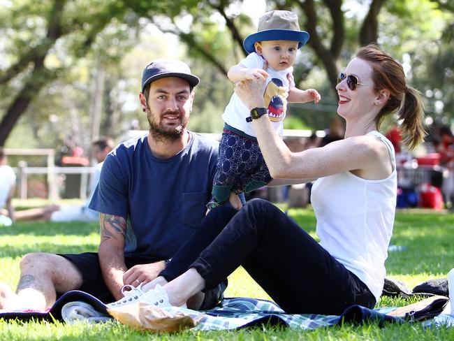 Isaac and Eliza Cook, with Ruben, enjoy a picnic at Edinburgh Gardens.