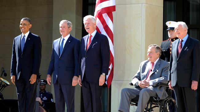 In 2013, then US President Barack Obama was pictured with former presidents George W. Bush, Bill Clinton, George H.W. Bush and Jimmy Carter. Picture: AFP