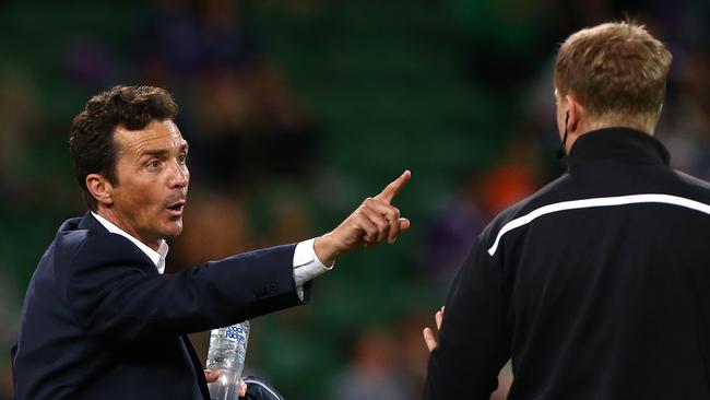 Adelaide United coach Guillermo Amor remonstrates with official Adam Fielding before being ejected during his team’s clash with Perth Glory. Picture: Paul Kane (Getty Images)