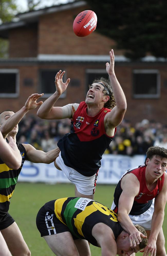 Mitch Smith marks the ball for Mt Eliza. Picture: Andrew Batsch