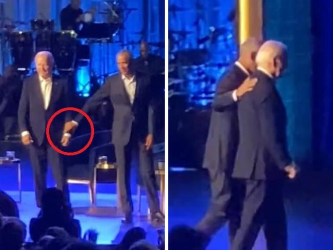 Biden freezes in awkward on-stage moment