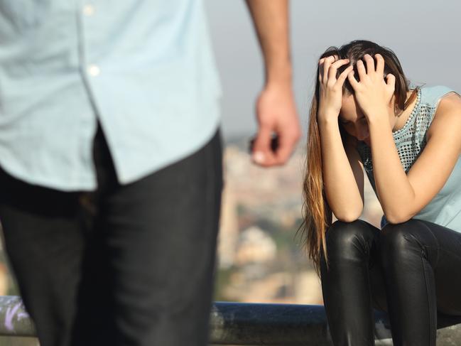 Breakup of a couple with bad guy and sad girlfriend with a city in the background