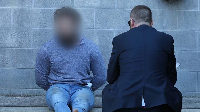 Joint Counter-Terrorism Taskforce arrest involving officers from the Australian Federal Police, NSW Police, ASIO, and other government agencies. Picture: Police Media