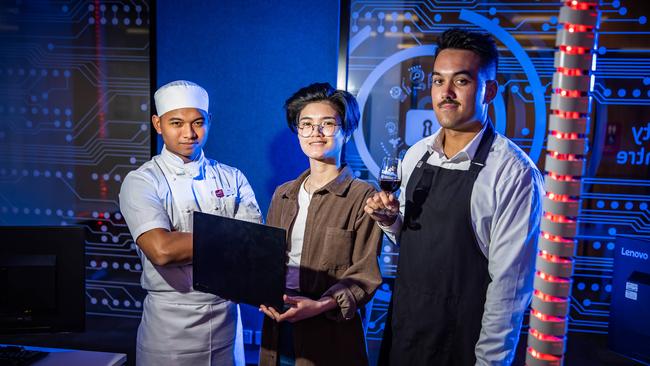 TAFE SA students Teo Adani Syahputra, 20, (Cookery and Hospitality), Maria Baylon, 23, (Cyber Security) and Liam Knevitt, 23, (Hospitality Management), on December 6th, 2022, at the city campus. Picture: Tom Huntley