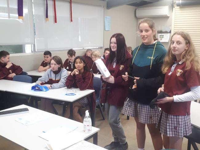 Alstonville High School students Ava Greentree, Zoe Fairfull and Brooklyn Bird presenting during Cows for Careers event.