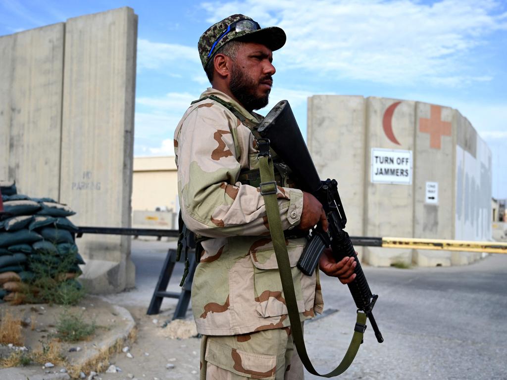 An Afghan National Army soldier stands guard at gate of a hospital inside the Bagram US air base after all US and NATO troops left. Picture: Wakil Kohsar/AFP