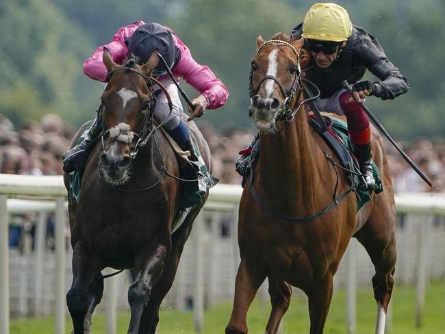 YORK, ENGLAND - AUGUST 20: Frankie Dettori riding Stradivarius (R) win The Weatherbys Hamilton Lonsdale Cup Stakes from William Buick and Spanish Mission (L) at York Racecourse on August 20, 2021 in York, England. (Photo by Alan Crowhurst/Getty Images)