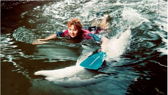 Melody Horrill will never forget the tight bond she formed with Port River dolphin, Jock. Picture: Mike Bossley