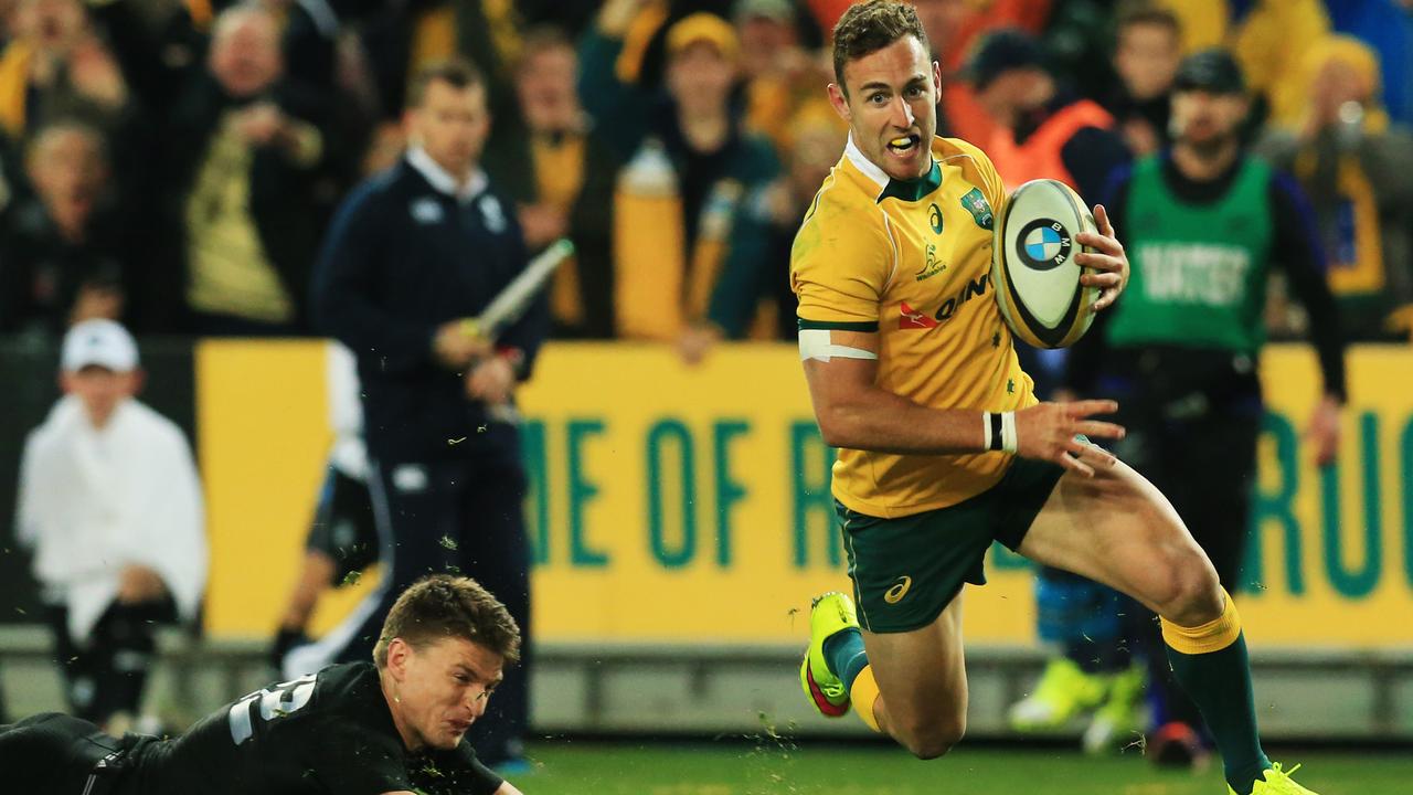 Nic White scores a try for the Wallabies at ANZ Stadium.