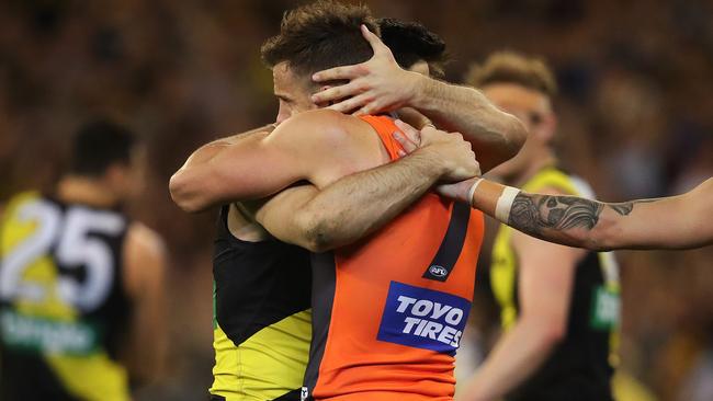 Trent Cotchin consoles former teammate Brett Deledio after the preliminary final. Picture: Phil Hillyard