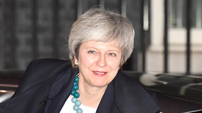 Britain's Prime Minister Theresa May returns to Downing street after postponing a  parliamentary vote on her Brexit deal in London on December 10, 2018. (Photo by Ben STANSALL / AFP)