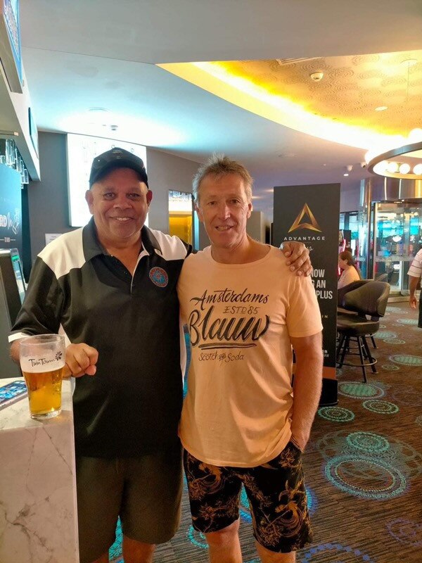 Spotted! Larry Corowa and Craig Bellamy having a beer together on the Gold Coast. Picture: Supplied.