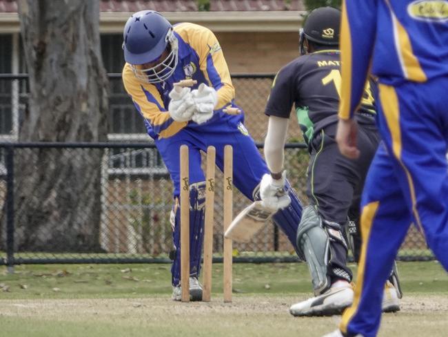 VSDCA Noble Park keeper Kolitha Weerasekera gets the stumping. Picture: Valeriu Campan