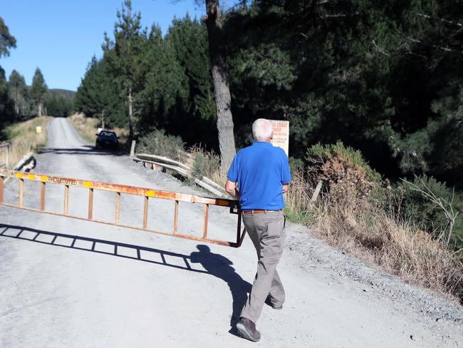 A man closes the entry to the Bruce Rifle Club in Milburn. Picture: Gary Ramage