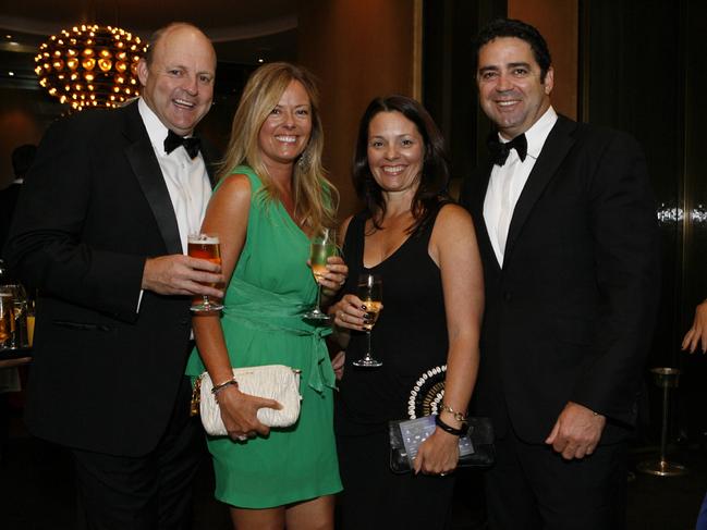 Former couples Billy and Nicky Brownless pose with Melissa And Garry Lyon before one of the biggest AFL scandals eventually unfolded. Picture: supplied