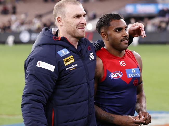 MELBOURNE, AUSTRALIA - AUGUST 23: Simon Goodwin, Senior Coach of the Demons embraces Kysaiah Pickett of the Demons after  the round 24 AFL match between Melbourne Demons and Collingwood Magpies at Melbourne Cricket Ground, on August 23, 2024, in Melbourne, Australia. (Photo by Darrian Traynor/Getty Images)