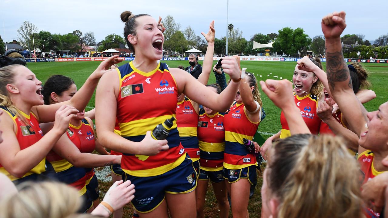 The Crows sing the club song after their record win. Picture: Mark Brake/Getty Images