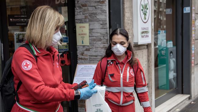 Red Cross volunteers have begun delivering medicine to the homes of vulnerable people in self-isolation in Italy. Picture: supplied