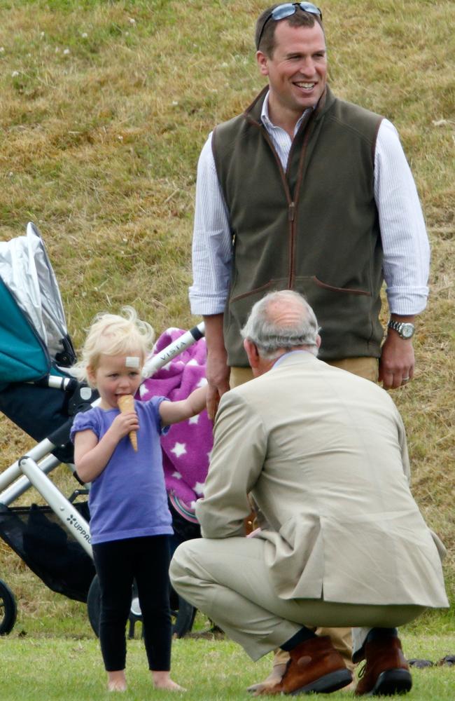 Isla Phillips, Peter Phillips and Prince Charles, Prince of Wales attend the Gigaset Charity Polo Match at the Beaufort Polo Club in 2015. Picture: Max Mumby/Indigo/Getty Images