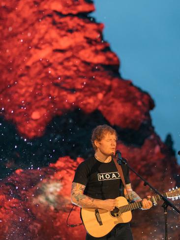 ... and Sheeran playing at the invitation-only Hanging Rock in February. Picture: Jaden Oswald