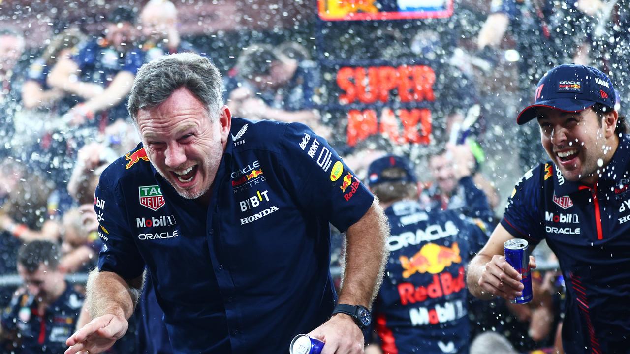 Christian Horner and Sergio Perez celebrate. (Photo by Clive Rose/Getty Images)