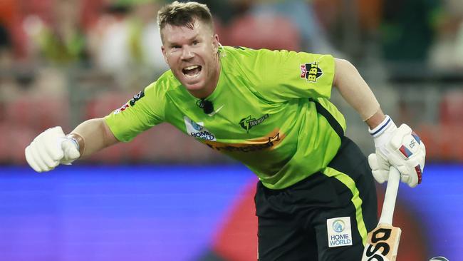 SYDNEY, AUSTRALIA - JANUARY 27: David Warner of the Thunder runs between the wickets during the Men's Big Bash League match between the Sydney Thunder and the Brisbane Heat at Sydney Showground Stadium, on January 27, 2023, in Sydney, Australia. (Photo by Mark Evans - CA/Cricket Australia via Getty Images)