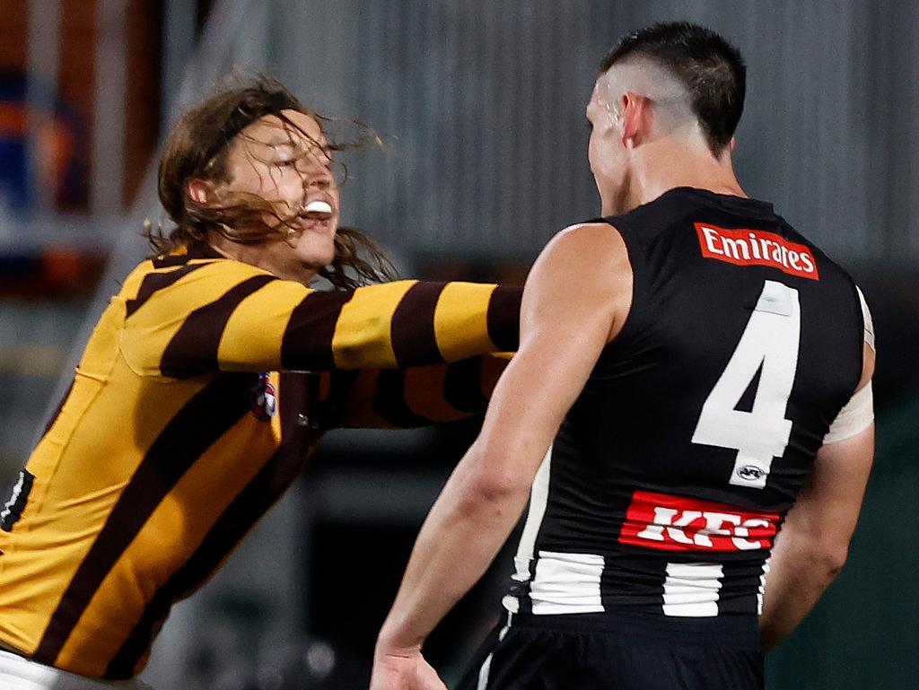 ADELAIDE, AUSTRALIA - APRIL 07: Jack Ginnivan of the Hawks and Brayden Maynard of the Magpies clash during the 2024 AFL Round 04 match between the Collingwood Magpies and the Hawthorn Hawks at Adelaide Oval on April 07, 2024 in Adelaide, Australia. (Photo by Michael Willson/AFL Photos via Getty Images)